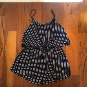 Romper. Caution to the wind. size large